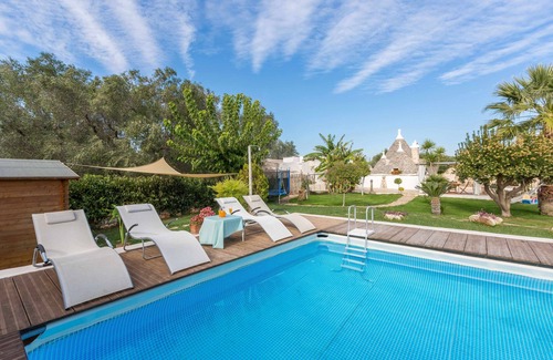 San Michele Salentino Villa | Trullo with private pool - garden games - outdoor kitchen - wood-burning oven