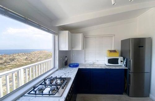 Elgin House | Turtle Creek in Pringle Bay