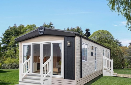 Aberystwyth House | Two bedroom caravan, sleeping four people, perfect for relaxing by the coast.