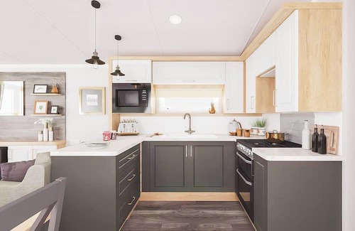 Aberystwyth House | Two bedroom caravan, sleeping four people, perfect for relaxing by the coast.