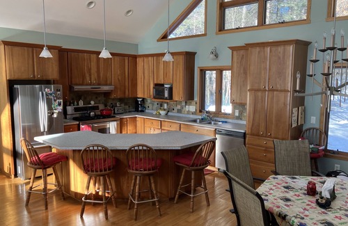 Shawano House | Two family, cozy, lake house retreat on Pine Lake.