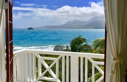 Frigate Bay Cottage | Two for One! Charming Cottage on hillside with private lounge on Turtle Beach!
