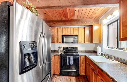 Camp Connell Condo | Two-story dog-friendly condo with balcony, washer/dryer, & full kitchen
