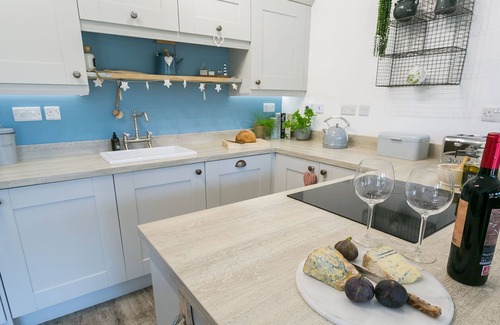 Llanddaniel Fab Apartment | Ty Coets - a ground floor bedroom that sleeps 7 guests in 3 bedrooms