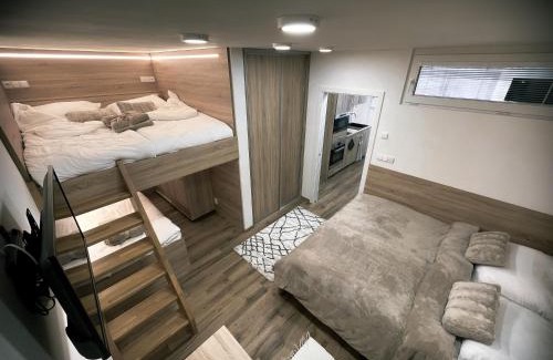 Dolni Morava Apartment | U Králíka, přízemní bezbarierové apartmány A,B,C,D - 50 metrů od vleku - přejdete v lyžácích, pod bobovou dráhou, parkování zdarma, lyžárna s vysoušeči bot,