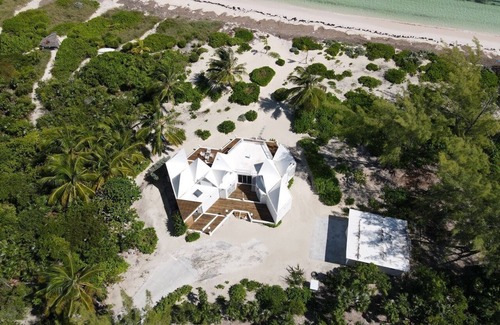 Winding Bay House | ULTRA LUX Coconut Cove Compound! 2.5 acres with 300 ft PINK SAND BEACH