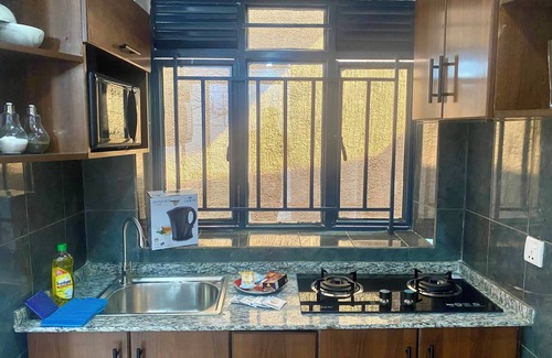 Kigali House | Unique 1+1- Private Work Station/Dining & Parking