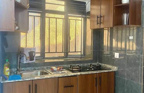 Kigali House | Unique 1+1- Private Work Station/Dining & Parking