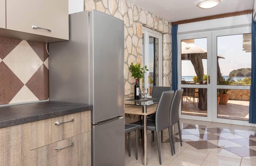Lozica Apartment | Unique Beachfront 2BDR Apartment With a Private Beach and Spacious Terrace