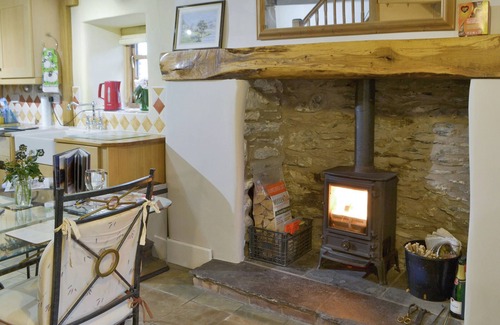 Ulpha Cottage | Unique cottage with a cosy living room set around an Inglenook fireplace.