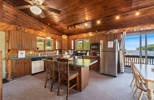 Wolcott House | Unique lake house built overwater on the Great Lakes, Sodus Bay Lake Ontario