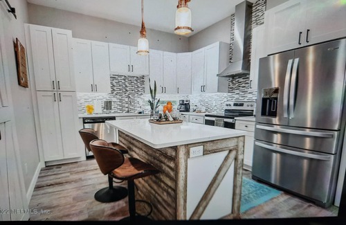 Putnam Hall House | Unique Loft with upstairs open floor plan with 4 car garage