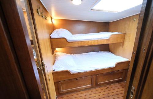 Amsterdam North Boat Rental | Unique Private Yacht Stay Amsterdam Black Swan