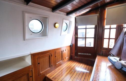 Amsterdam North Boat Rental | Unique Private Yacht Stay Amsterdam Black Swan