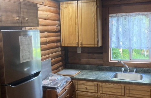 West Grey Cabin | Unique secluded Log Cabin on Private Spring fed lake