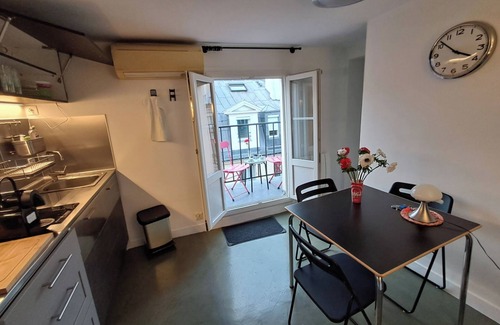 Saint-Thomas-d'Aquin Apartment | Unit018 Saint Germain Saints Pères Air-conditioned, balcony, Eiffel Tower view.