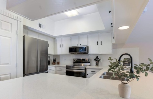 April Sound Condo | Updated Boho condo, dock your boat or enjoy the Conroe Lake views from your deck