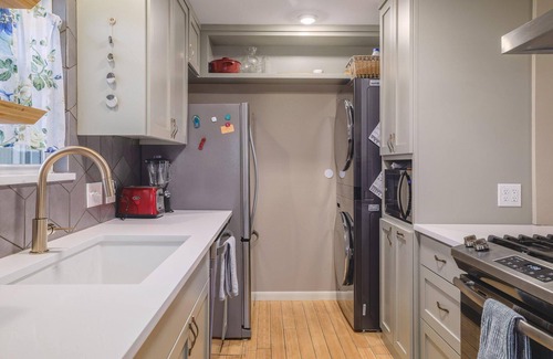 Barton Hills House | Updated duplex in Barton Hills with open kitchen, great patios. Fenced yard.