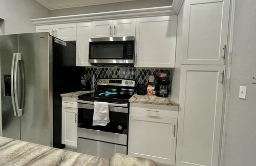 Seminole Condo | UPDATED REMODELED CONDO- NO STAIRS 2 MILES TO THE BEACH! PETS ok! HEATED POOL