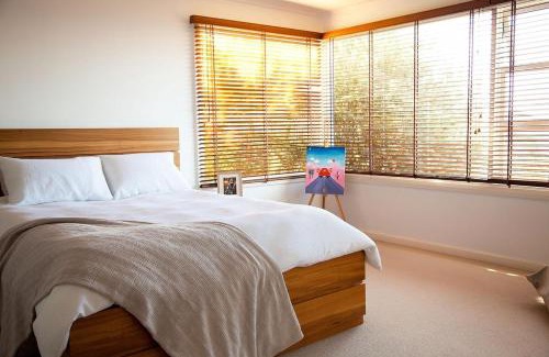 Blackmans Bay House | Urban farm stay with water views