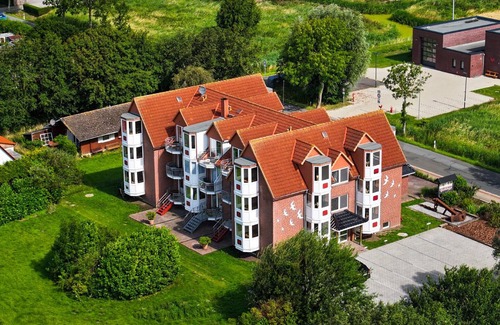Cappel-Neufeld Apartment | Vacation apartment Hansekogge 4-18, picturesque and with sauna.