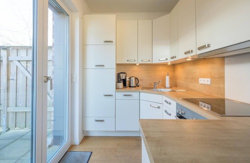 Zentrum Apartment | Vacation apartment Hafenquartier 54° N in Husum for up to 4 people
