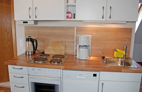 Samtens Apartment | Vacation apartment Pommernhof on the upper floor with sitting area in the garden - Ferienwohnungen auf dem
