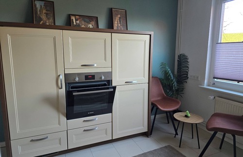 Nordholz House | Vacation home Windschief directly behind the dike with large garden, WLAN, fireplace