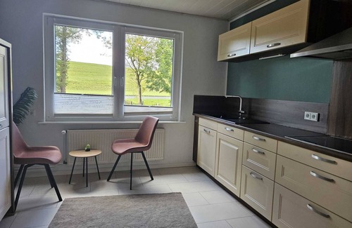 Nordholz House | Vacation home Windschief directly behind the dike with large garden, WLAN, fireplace