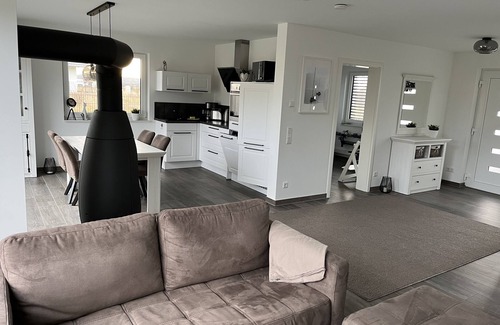 Lobnitz House | Vacation home Hilde on the lake with private beach for 4 adults, fireplace, boat and sauna