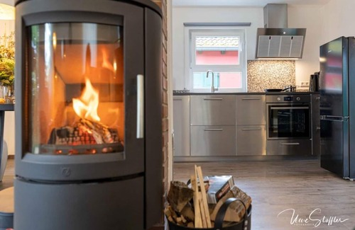 Langenburg House | Vacation home Schrat with fireplace in an idyllic location on the edge of the forest below a wellness hotel.