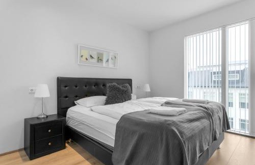 Vesturbær Apartment | Venture Vacation-King bed, central apartment with free parking