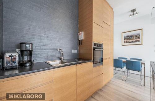 Vesturbær Apartment | Venture Vacation-King bed, central apartment with free parking