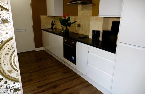Rotherham Apartment | Versace Gold Apartment Opulence