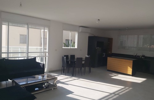 Netanya Cottage | Very beautiful penthouse with a hot swimming pool under blue skies .