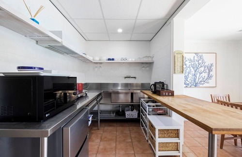 Emerald Beach House | Victoria’s Poolside Emerald Beach stay with Shared Pool, Near Beach and Cafes.