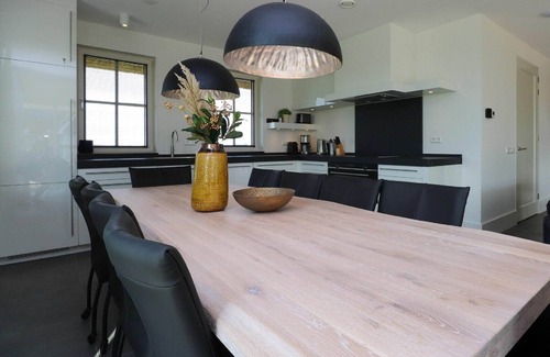 Delfstrahuizen Villa | Villa by the Water with Sauna and Terrace
