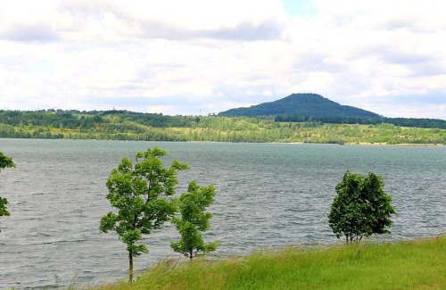 Deutsch Ossig Apartment | Villa Ilex - Ein Massivholzhaus direkt am See