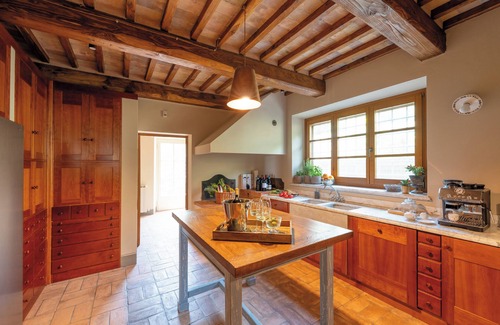 Passignano sul Trasimeno Villa | Villa with large pool that blends with the lines of the lake Trasimeno