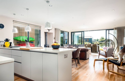 Somerford Keynes House | Villa with direct lake access, hot tub, swimming pools, tennis & restaurant