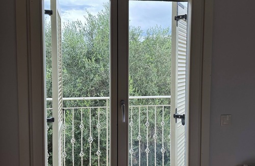 Petaleia House | Villa with Private Pool set in a Large Garden in Avlaki near Kassiopi. EOT/MHTE