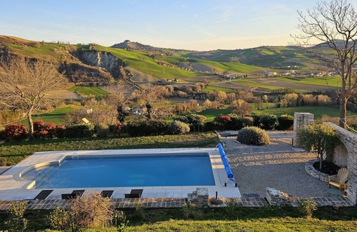 Force Villa | Villa with stunning views of the hills and private pool.