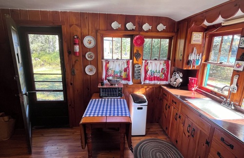 Winter Cabin | Vintage log cabin located in the Chequamegon National Forest on Blaisdell Lake.