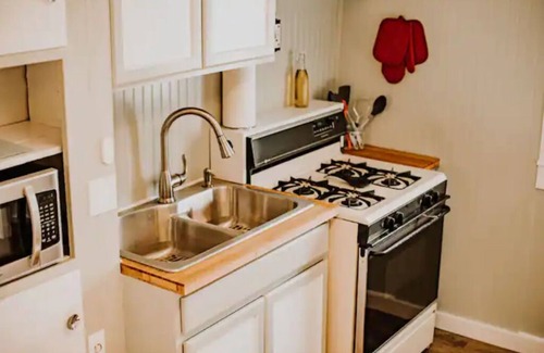 Dillon Apartment | Vintage shotgun home with modern updates