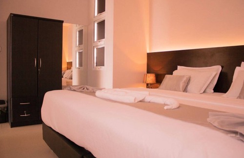 Mandhoo Hotel | VIOLET INN