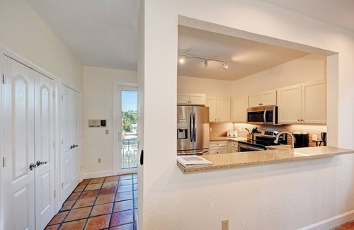 Siesta Key Village House | Vitamin Sea |Dog-friendly Spanish-style Townhome, Steps to SK Beach & Village
