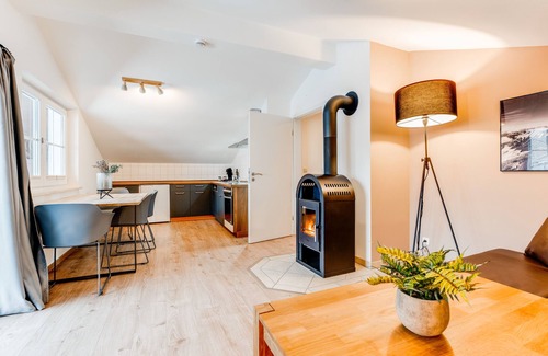 Unterjoch Apartment | VYLD: Eagle view mountain view and fireplace