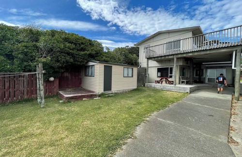 Castlepoint House | Waiwhare On The Beach (beachfront property with direct beach access)