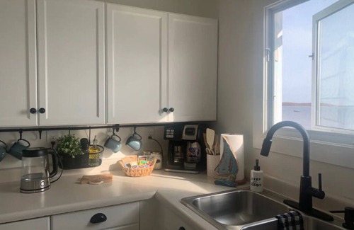 Cormierville Cottage | Wake up to the Sunrise in This Renovated Ocean-front Cottage!