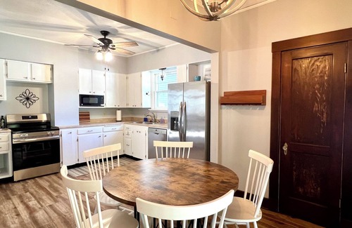 Salina House | Walk downtown, Charming 3 BR -2 King beds, Porch, Fire Pit, Theatre, Fenced Yard